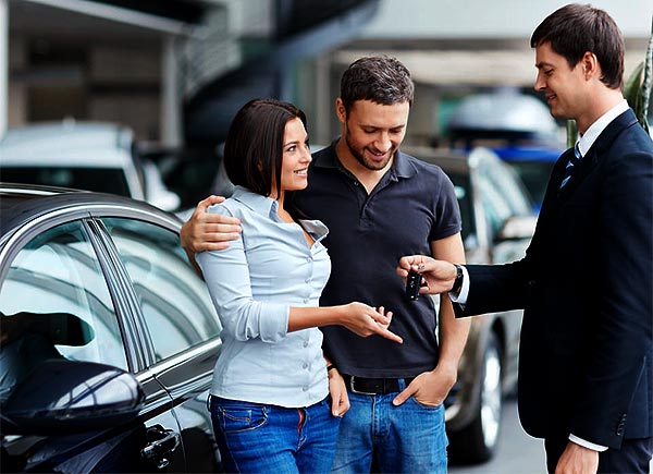 car salesman and customers