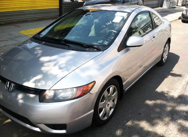<strong>2006 HONDA CIVIC LX - Asking Price: $5,999</strong> - This Civic 1.8L, silver color, coupe, with leather seats and CD changer, has only 113k miles and could be yours for less than $6000 or $99 per month. If you are interested, It is for sale in <span class='u'>New York, NY</span> by United Auto Sales dealership, and you can contact them at 877-885-1303.