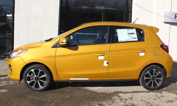 https://www.autopten.com/autoblog/photos/2023-mitsubishi-mirage-yellow-cheapest-new-cars-top-5.jpg