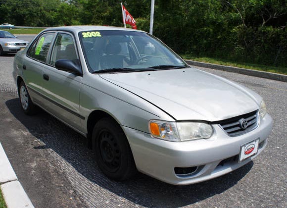 <strong>Cheapest Toyota Corolla 2002 for sale.</strong> This silver one is the most affordable Corolla '02 you can find at the moment of publishing this article. It has <span class='u'>176k miles</span> and is offered in <strong>Toms River, New Jersey</strong> by Gateway Toyota car dealer. <strong>Price asking: </strong> <span class='u'>$3,134</span>. If you are interested, please give them a phone call at <span class='u'>877-354-2798</span> for more information.