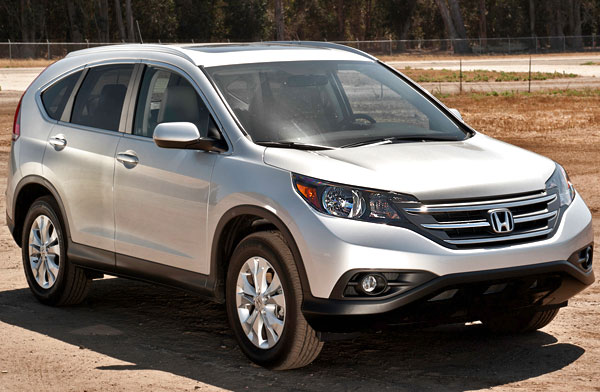 The appearance of the 2013 Honda CR-V clearly remembers its predecessor but with a more aggressive look that makes it feel bigger. Honda increased the trunk space capacity for this new model too.